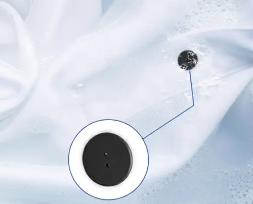Two-hole PPS RFID laundry tag sewn onto textile